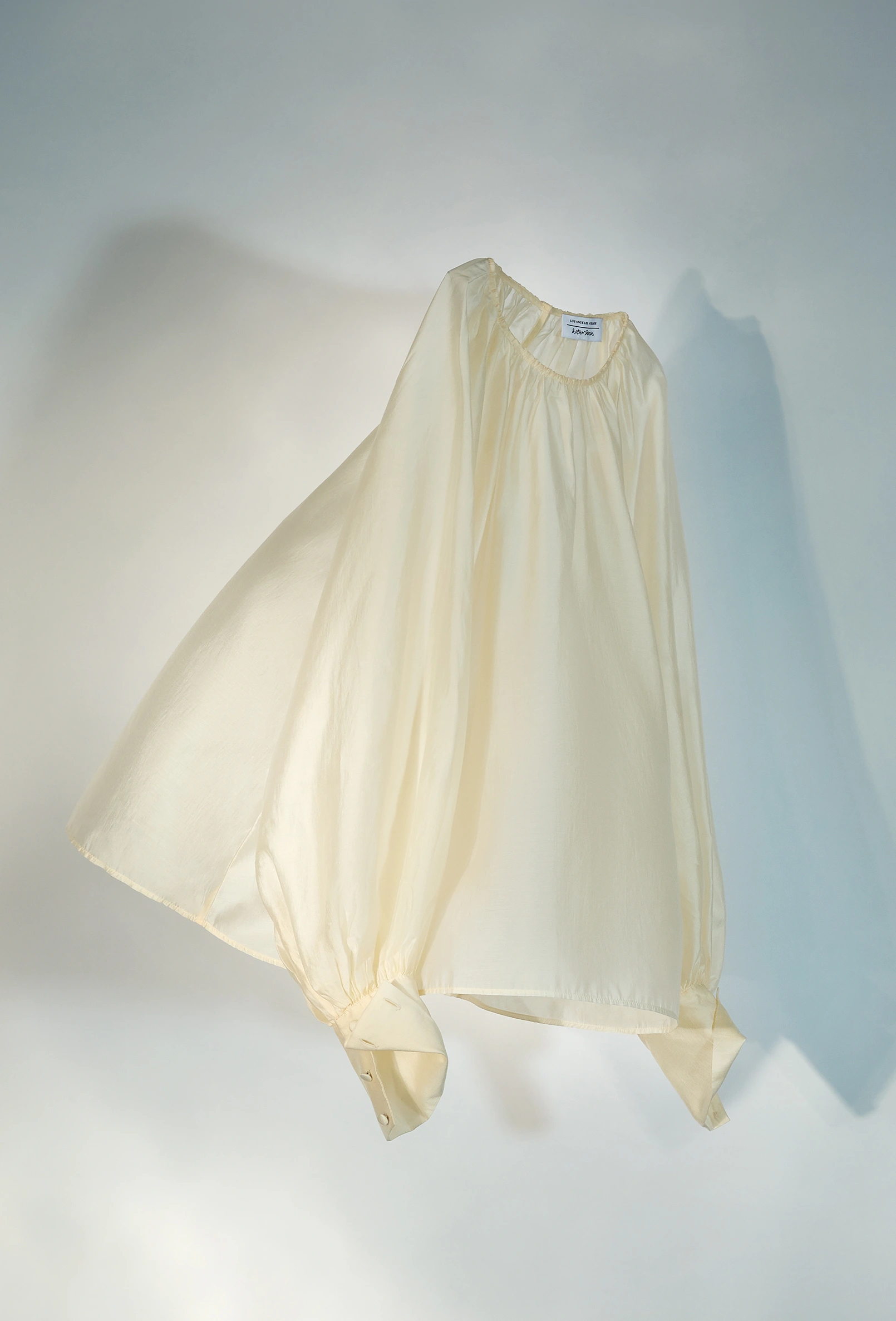 packshot-campaign-cream-blouse-floating-shadows-nov25