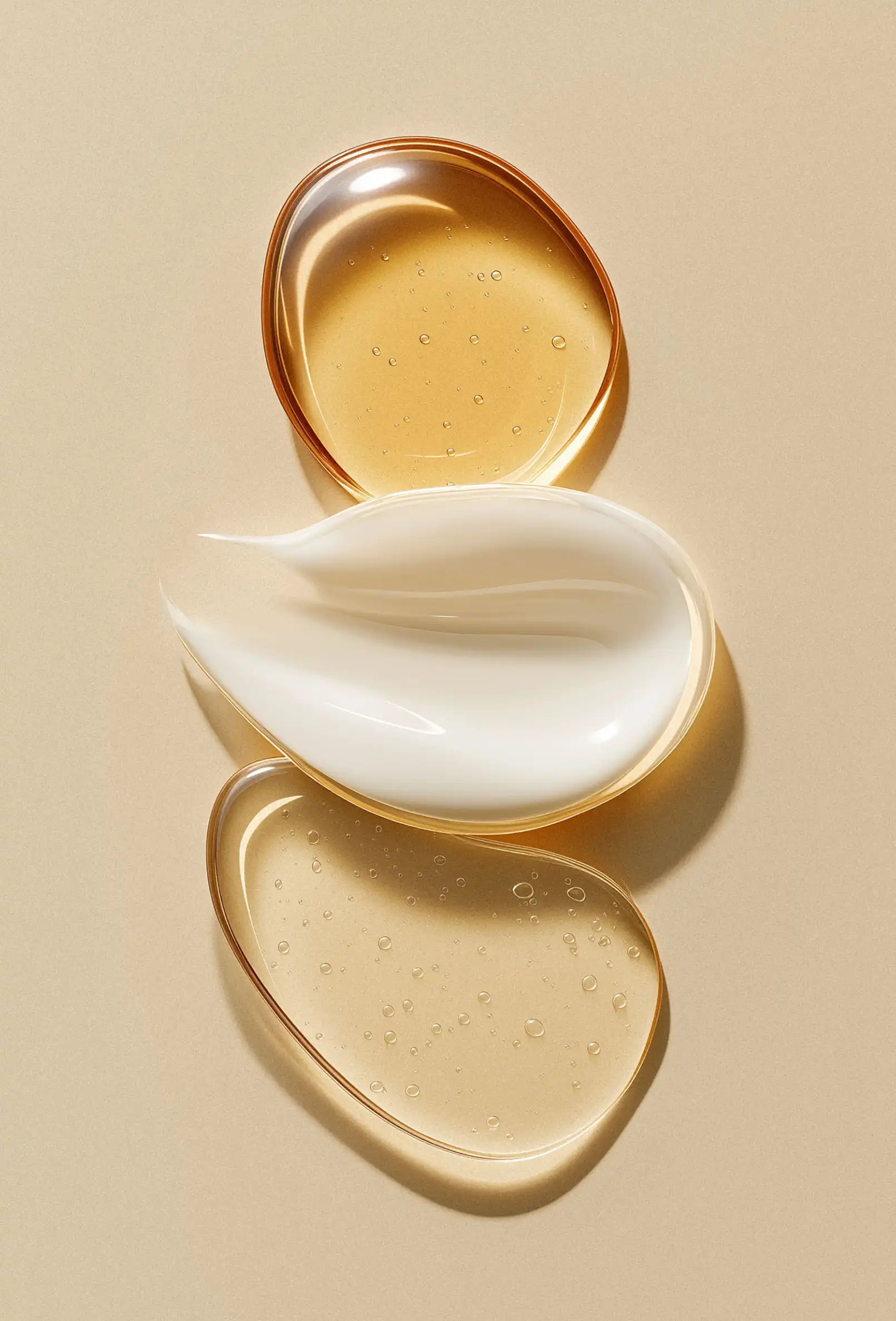 packshot-cosmetics-ai-liquid-textures-warmlight-nov25