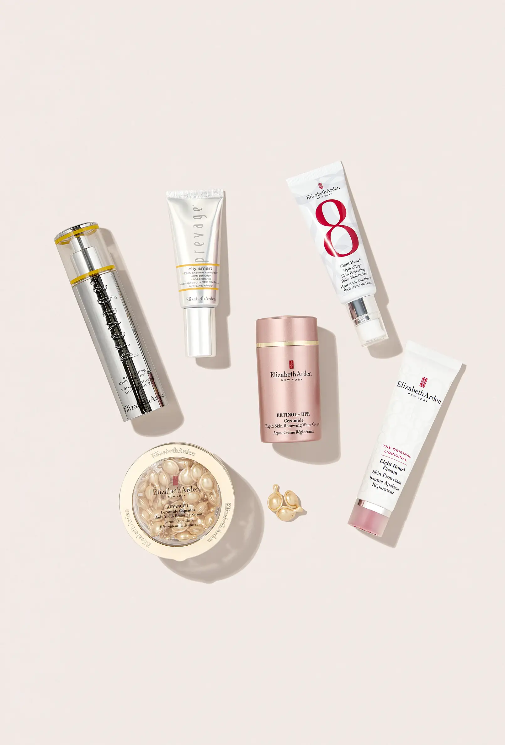 packshot-cosmetics-skincare-products-pink-surface-nov25