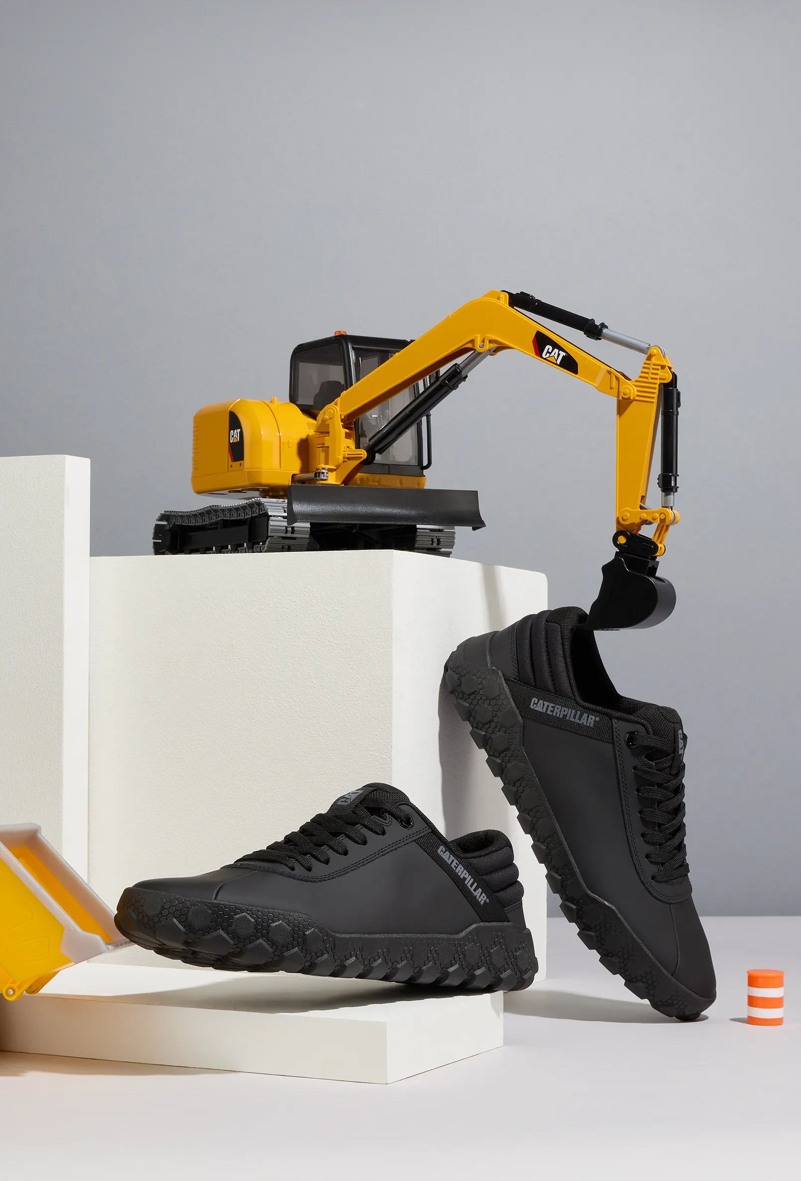 packshot-stilllife-black-sneakers-toy-diggers-nov25