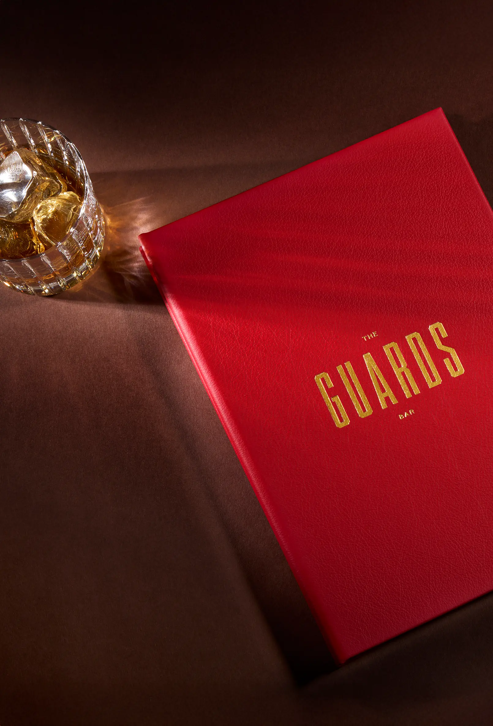 packshot-stilllife-red-book-whiskey-glass-nov25
